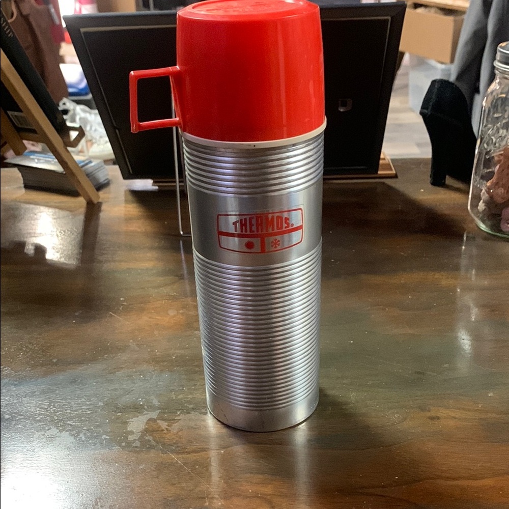 Thermos Metallic Silver with Bold Red Cap